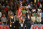 3 female Color Guard members present during the Women's NCAA Basketball tournament