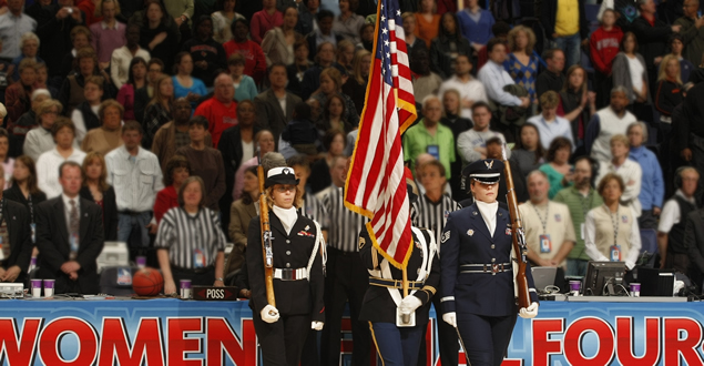 3 female Color Guard members present during the Women's NCAA Basketball tournament
